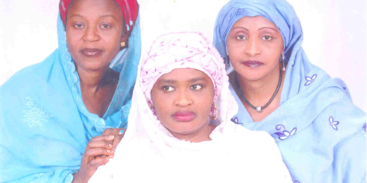 Hajiya Altine Abdullahi is in the middle