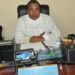 Alhaji Garba A. Dangida in his office - in those days!